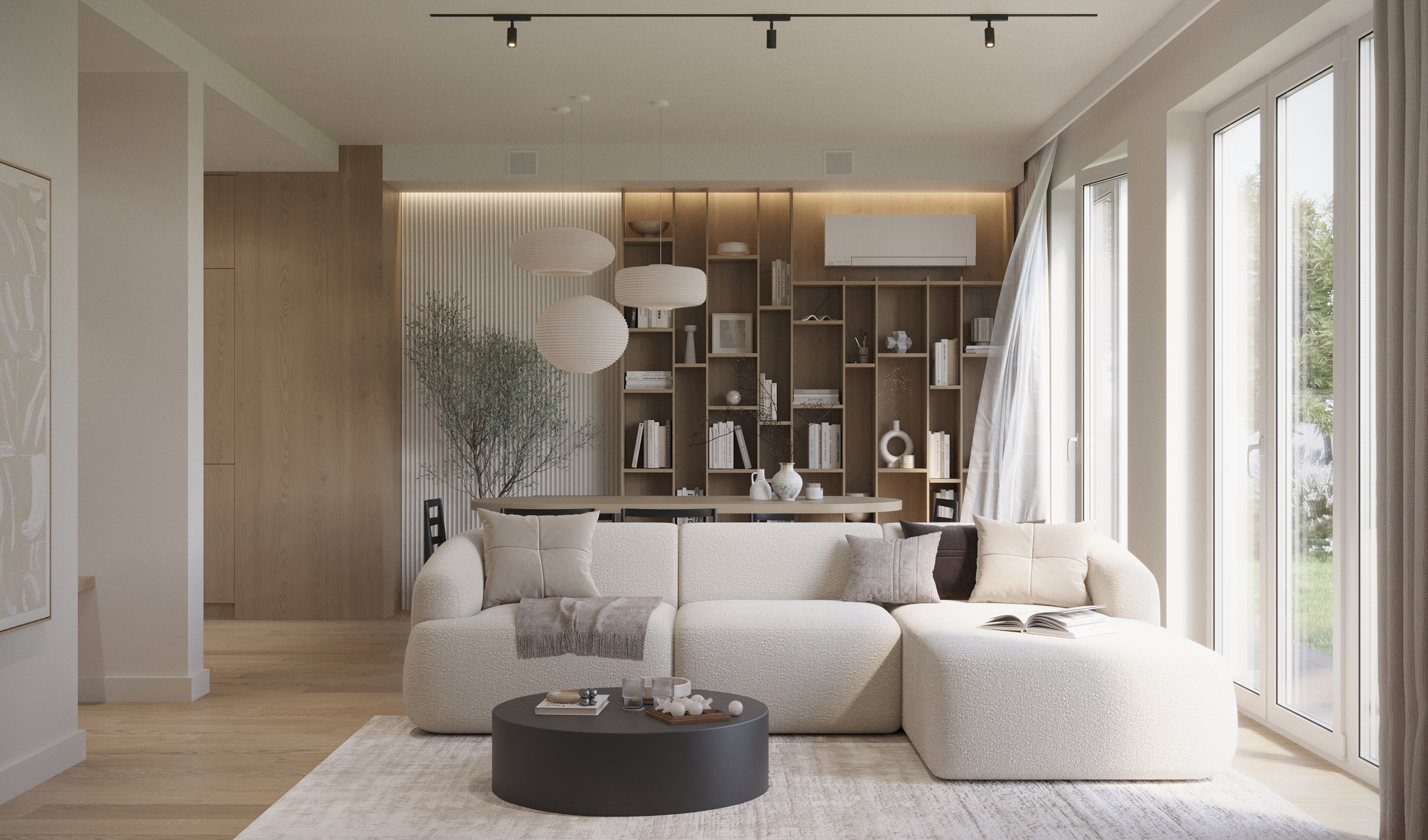 Salon z jasną sofą bouclé, czarnym stolikiem kawowym i regałem na całą ścianę z dekoracjami.